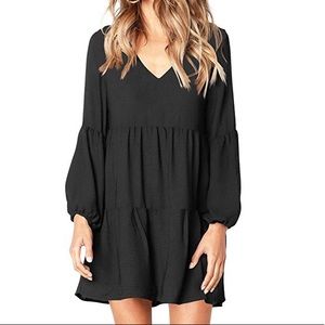 Super cute black flowy dress.